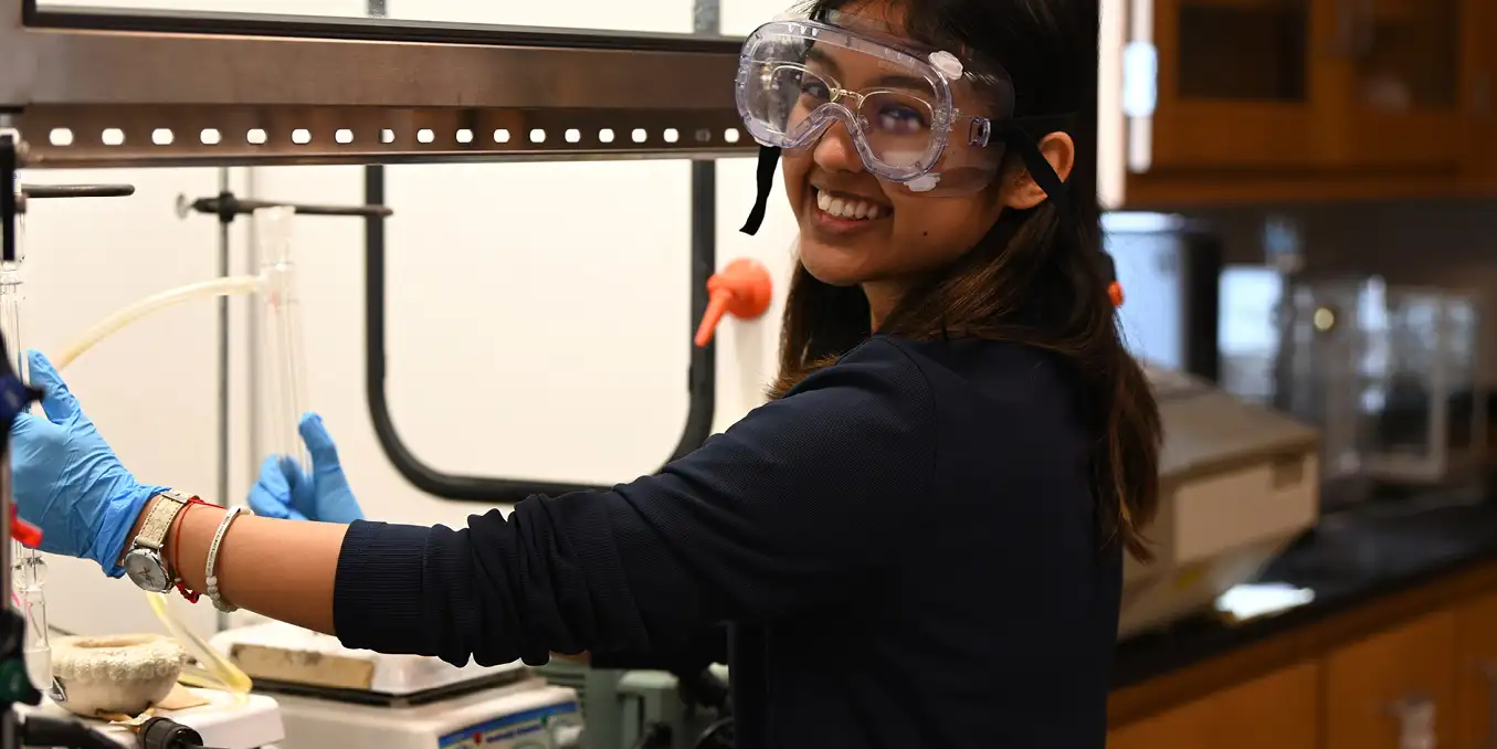 STEM student working on a project in a lab