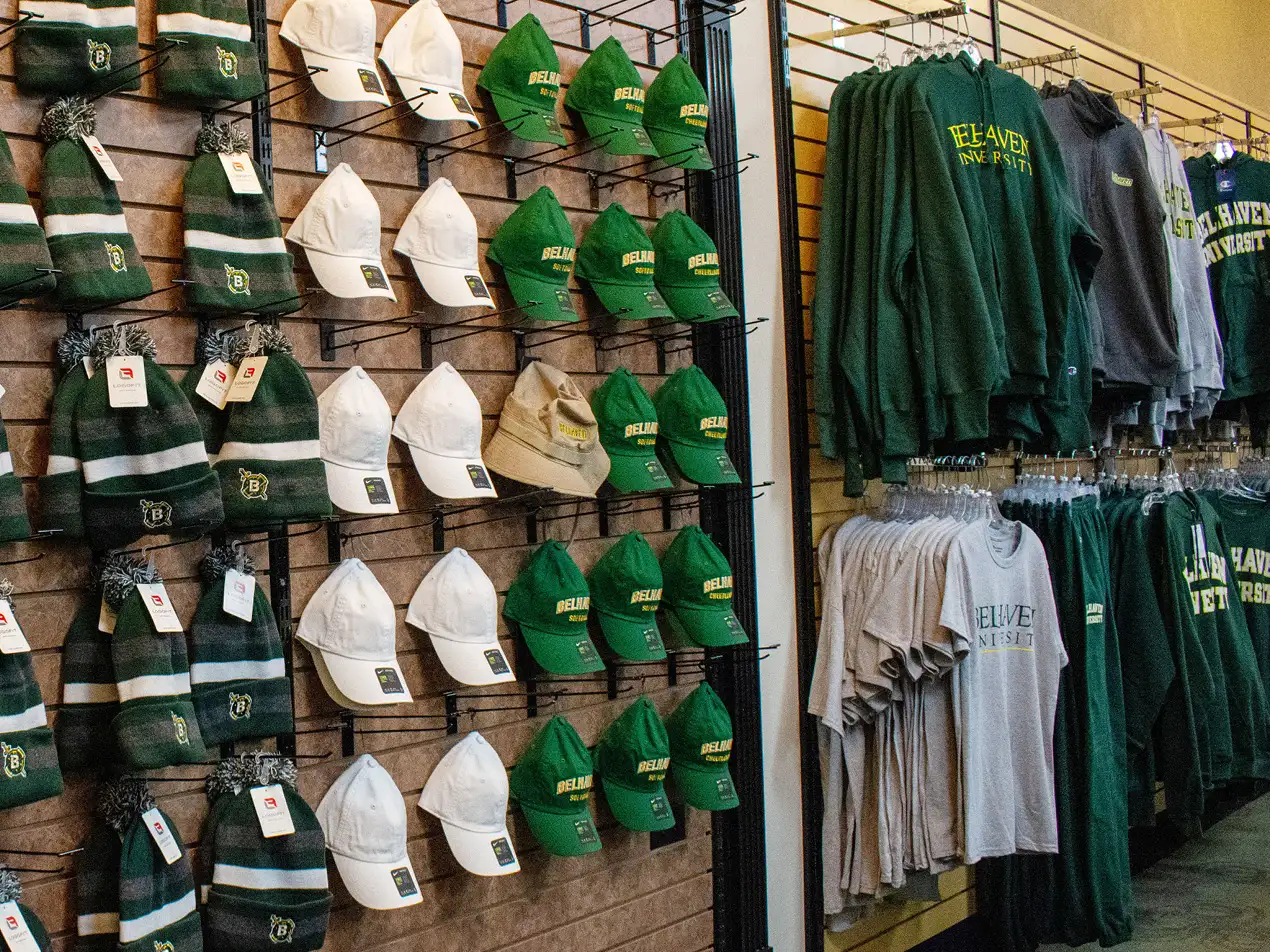 a rack of Belhaven apparel in the bookstore