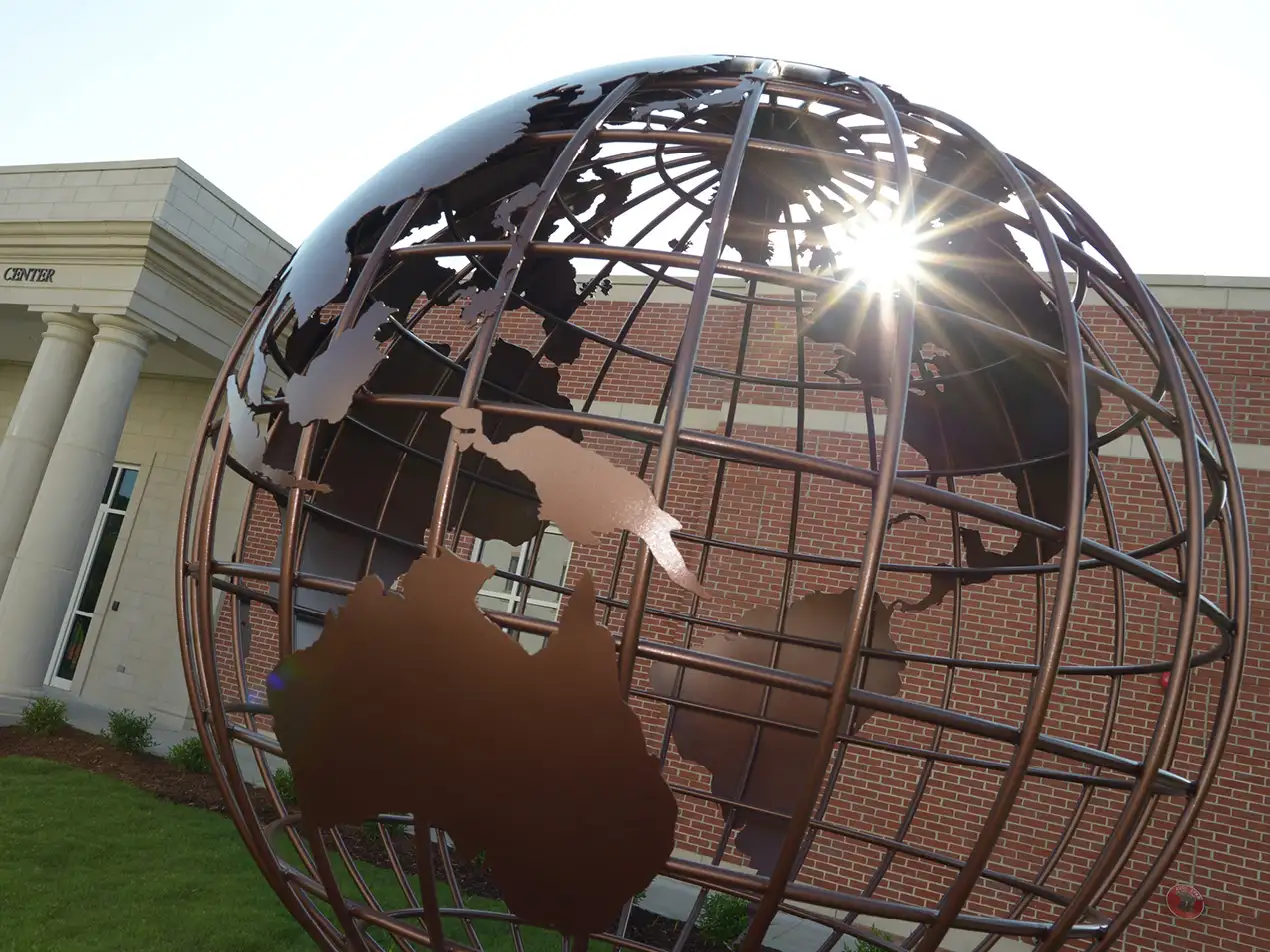 closeup of the globe and the Billy Kim Center