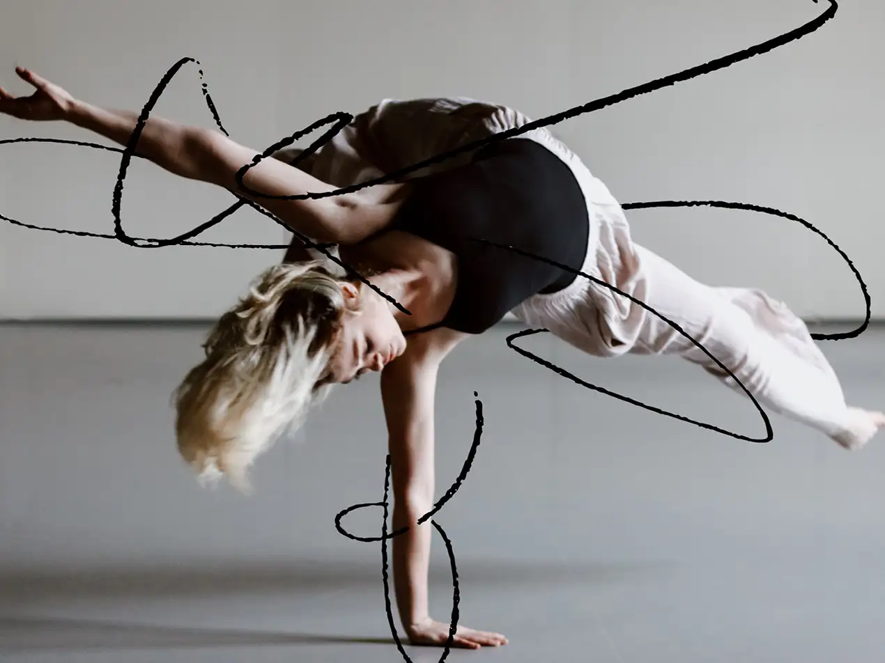 dance student performing with artwork 