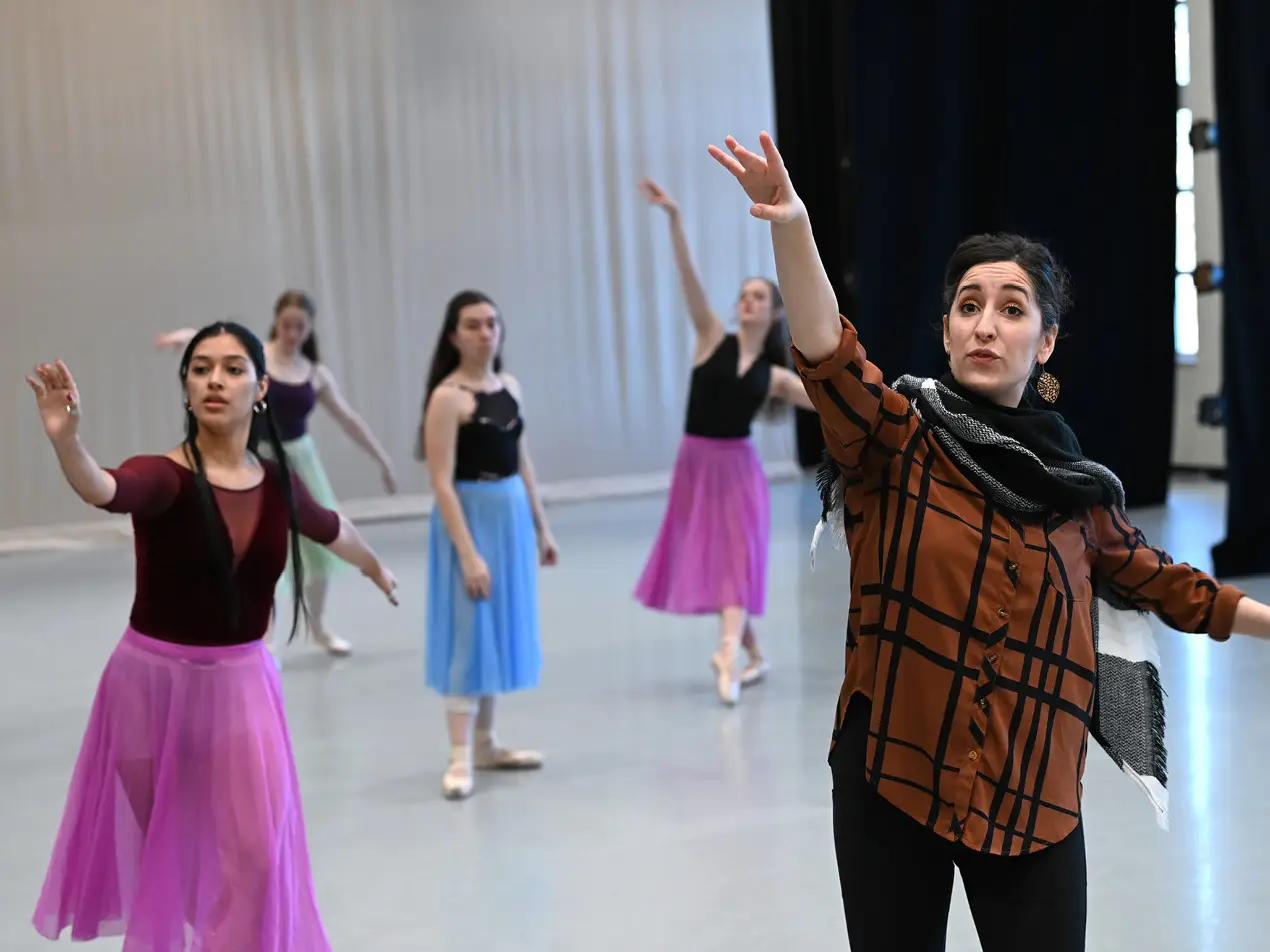 dance students rehearsing with instructor
