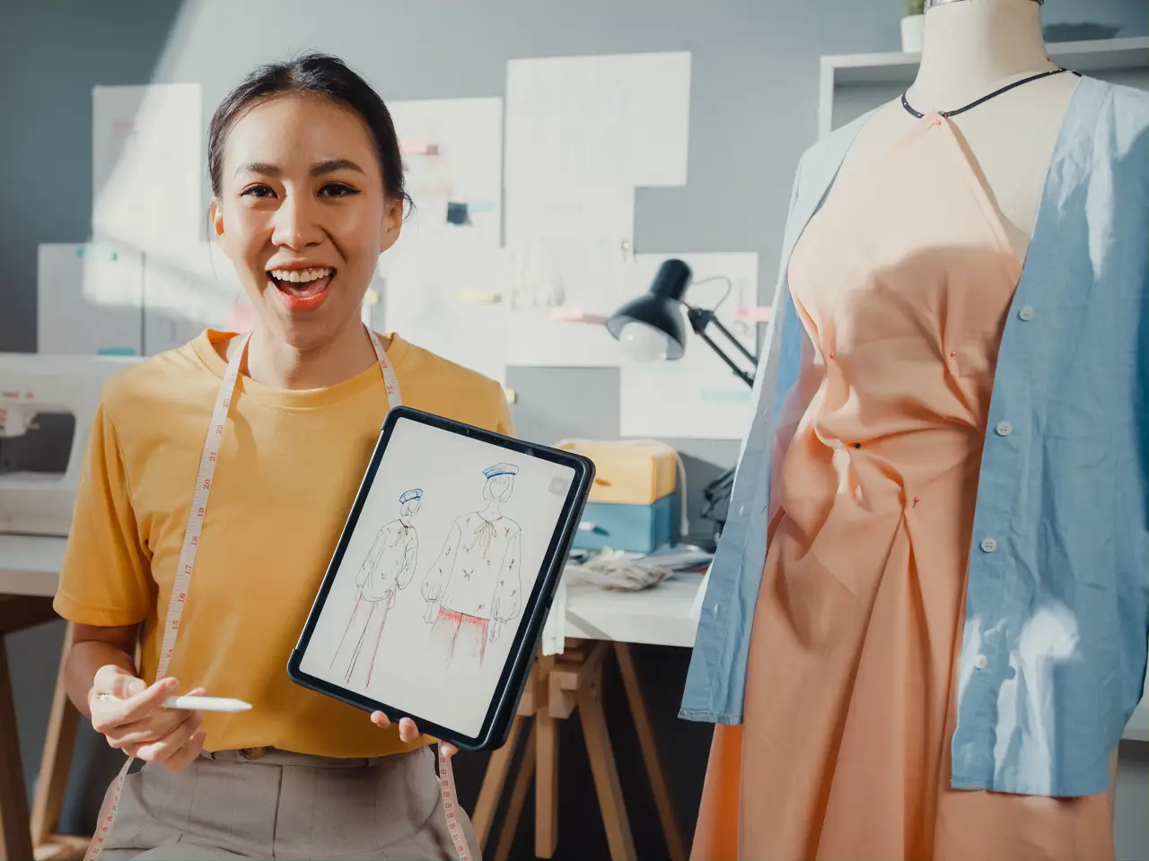 fashion design student with tablet 