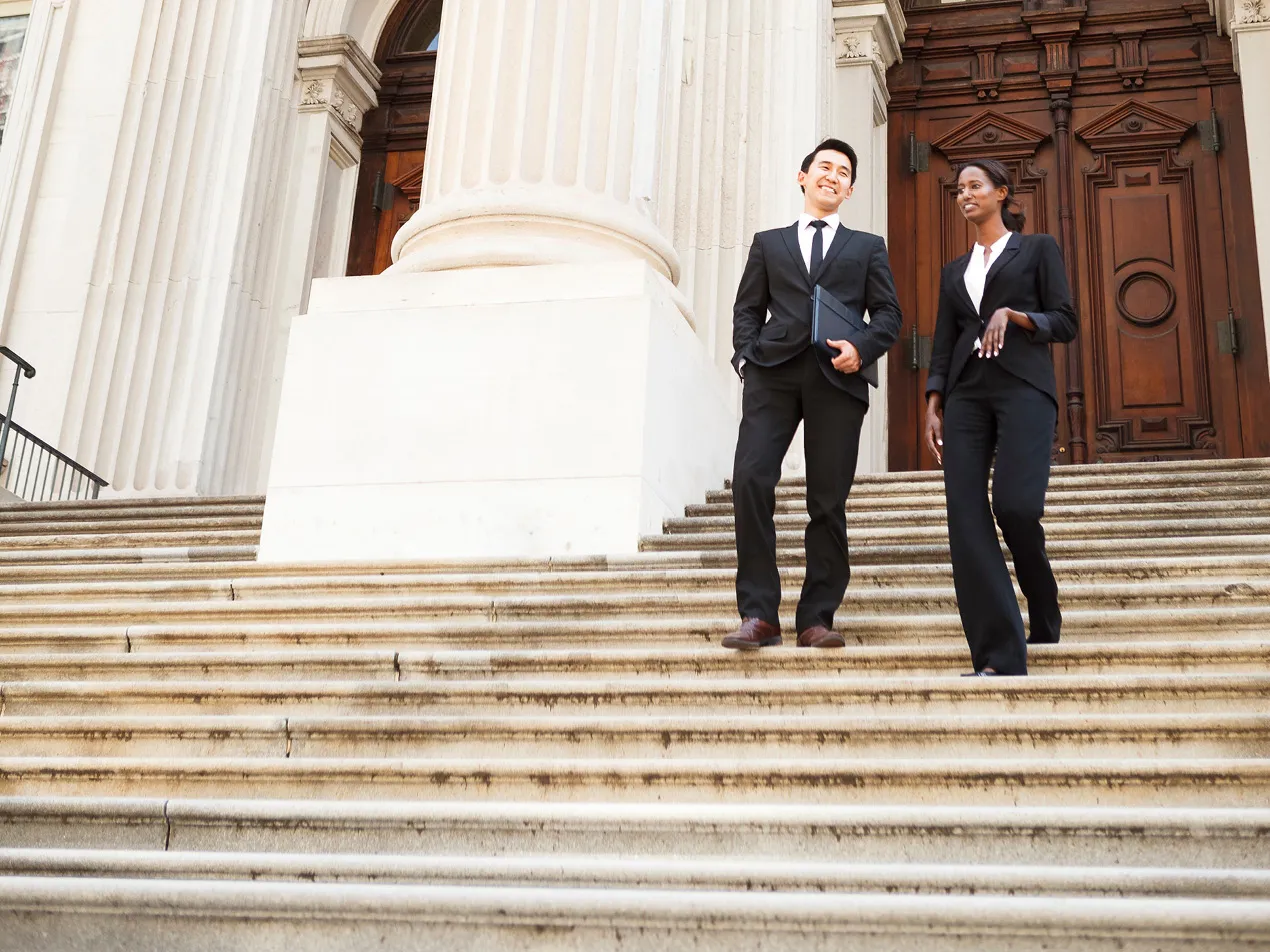 public administration professionals walking down steps