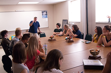 Students and professor in a classroom setting