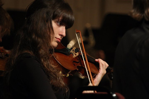 student playing the violin