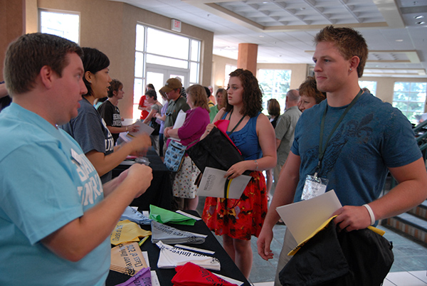 admission representatives greeting students at transfer day