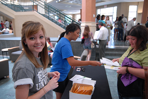 admission representatives greeting new students at transfer day